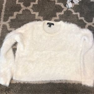 white fuzzy sweater